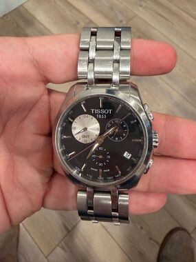 Tissot Men's Stainless Steel Watch with Black Dial and Silver Accents